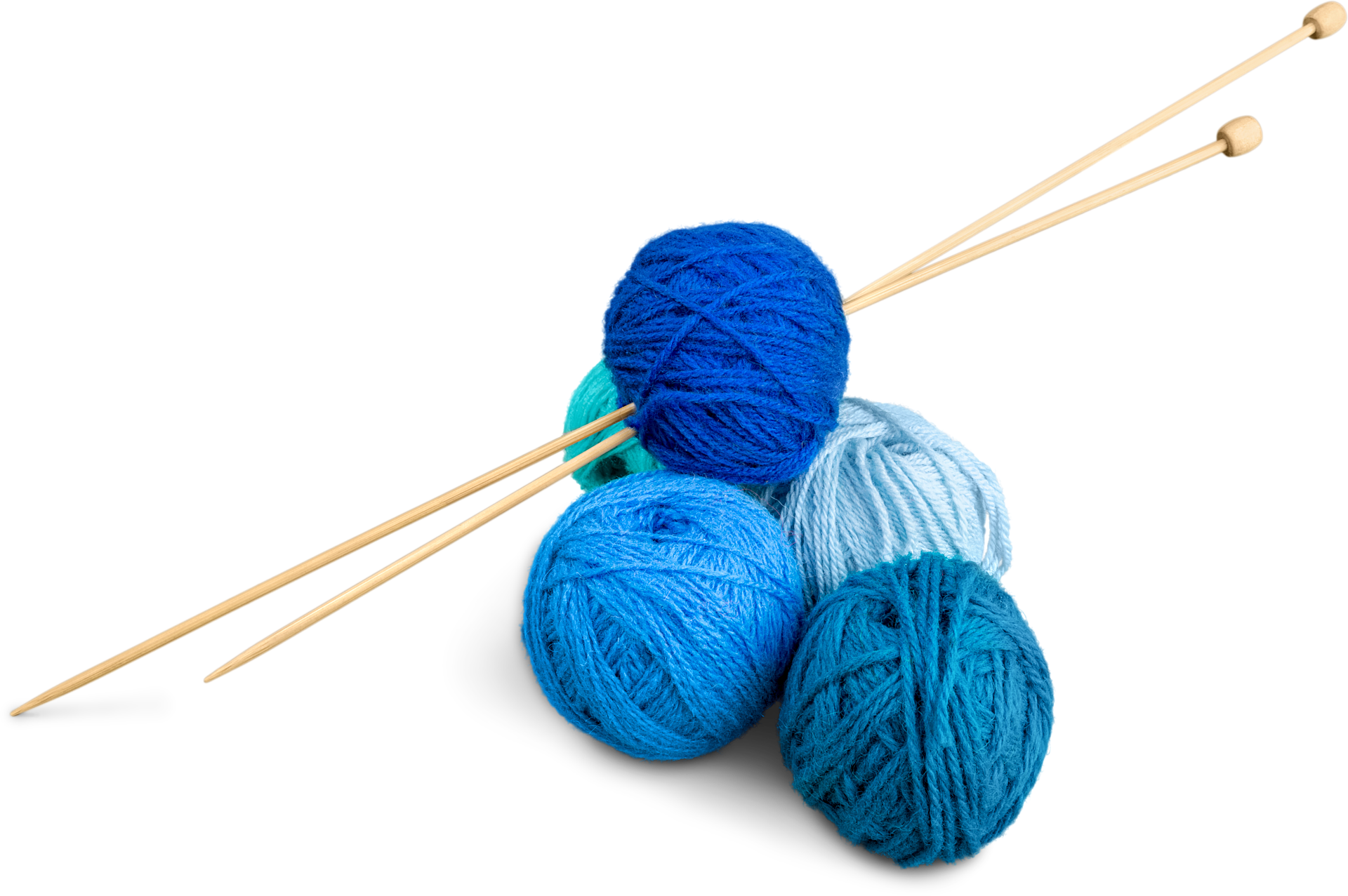 A Group Of Balls Of Yarn With Needles