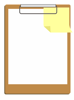 A Clipboard With A Yellow Sticky Note