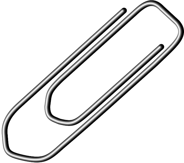 A White Paper Clip On A Black Background