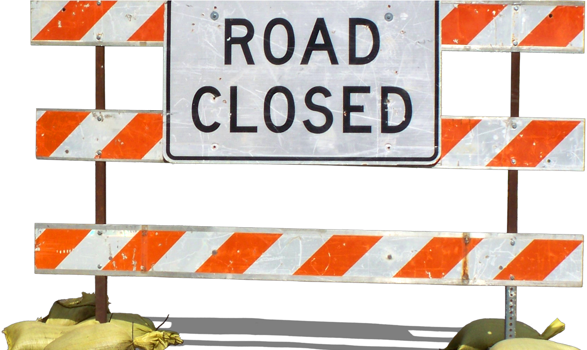 A Road Closed Sign On A Black Background