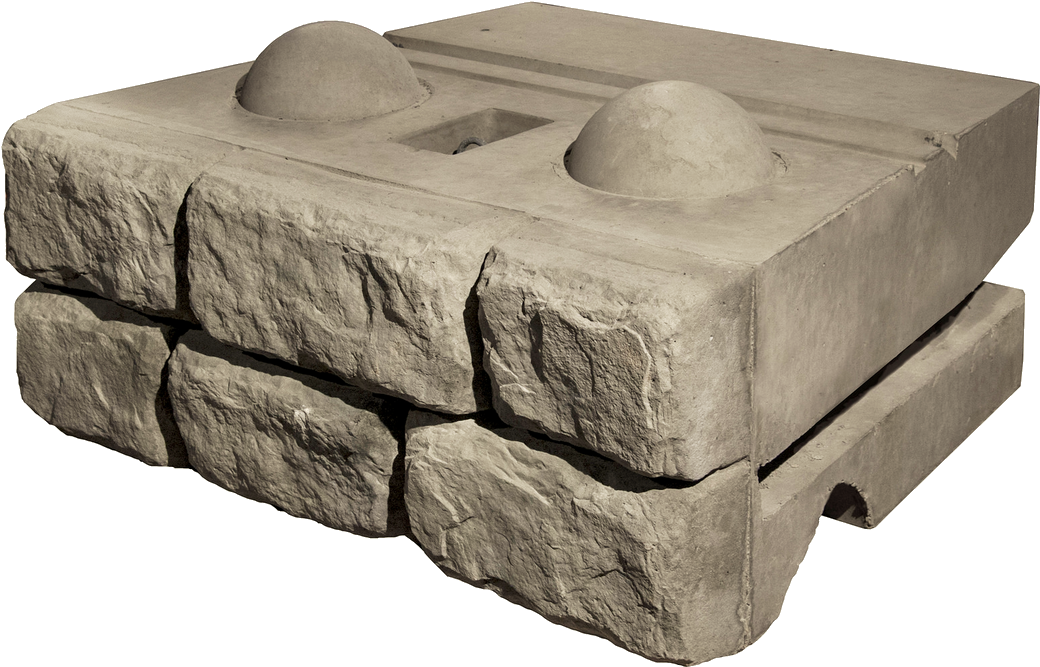 A Stone Block With Two Round Objects