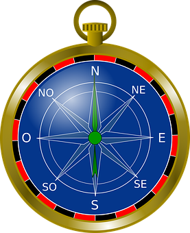 A Blue Compass With Green Center