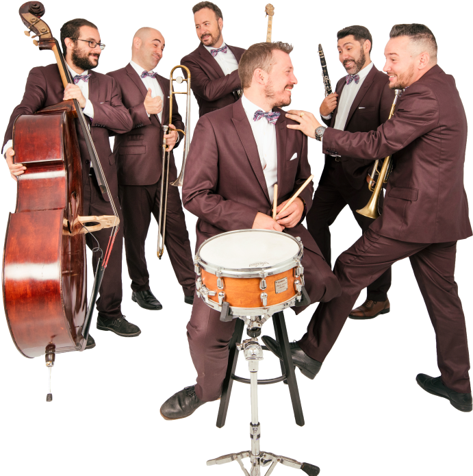 A Group Of Men In Suits Playing Instruments