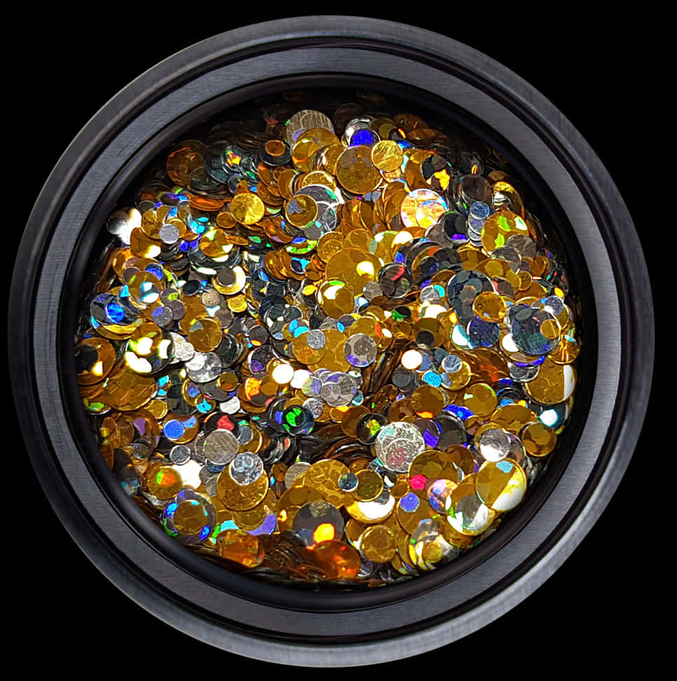 A Black Container With A Black Rim Filled With Colorful Coins