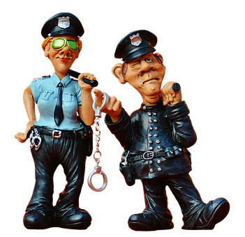 A Statue Of A Police Officer And A Police Officer