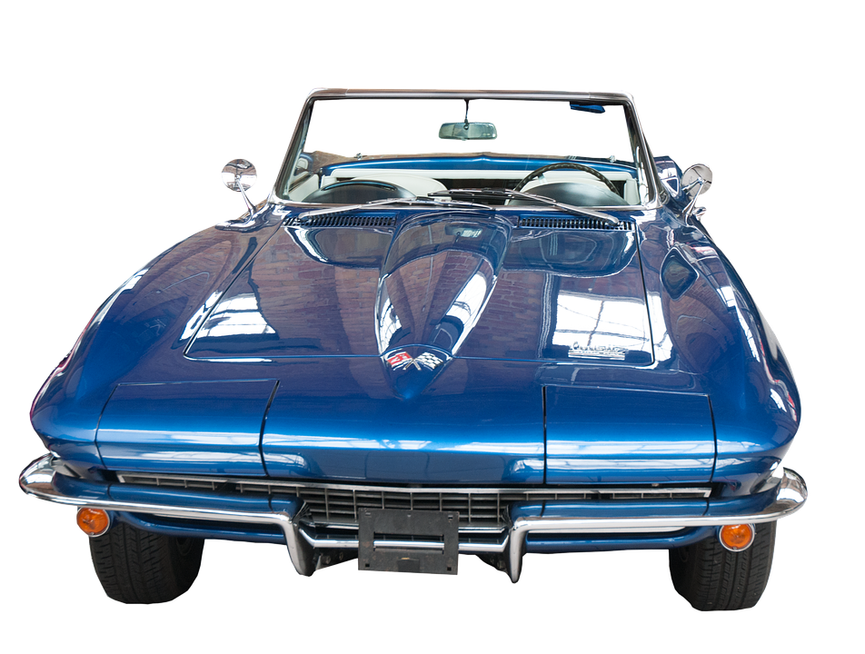 A Blue Convertible Car With A Black Background