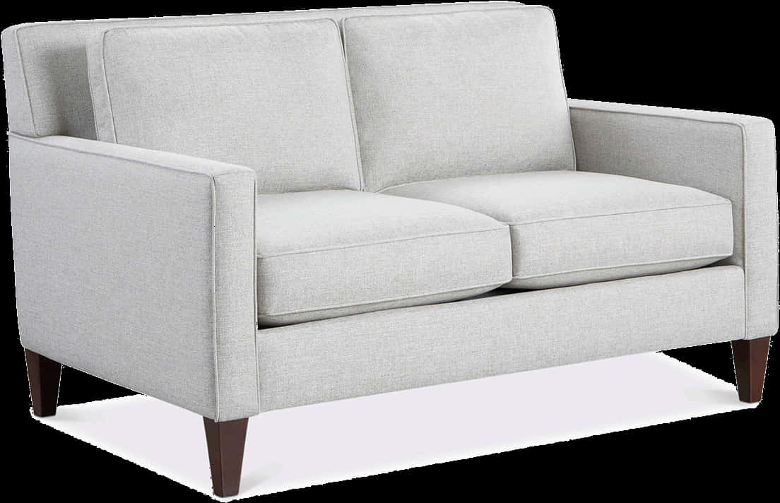 A White Couch With Dark Legs
