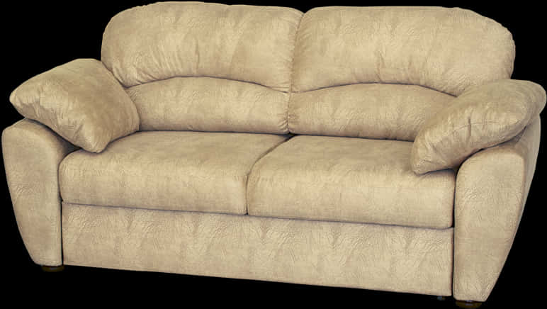 A Beige Couch With Two Pillows