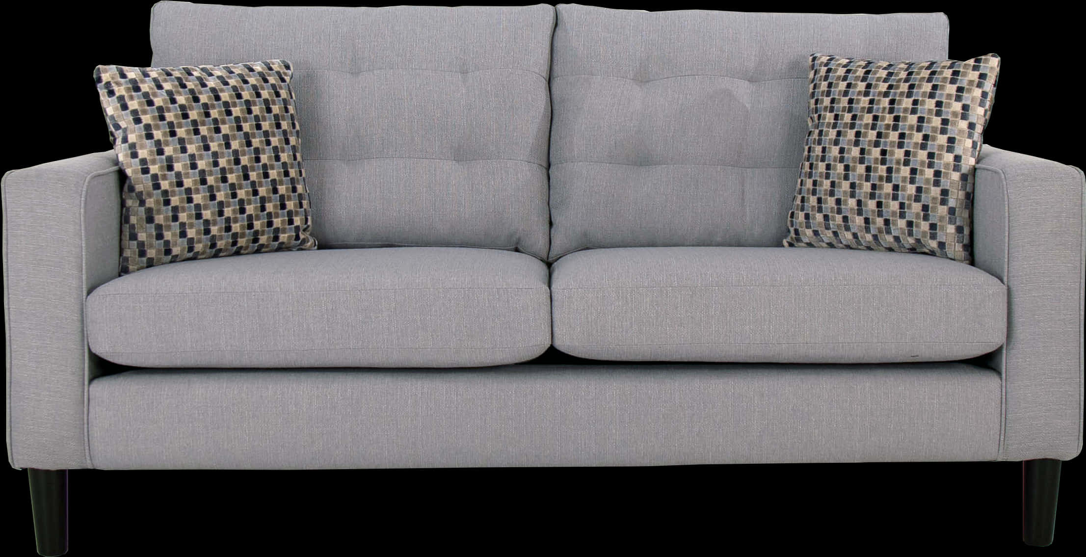 A Grey Couch With Pillows