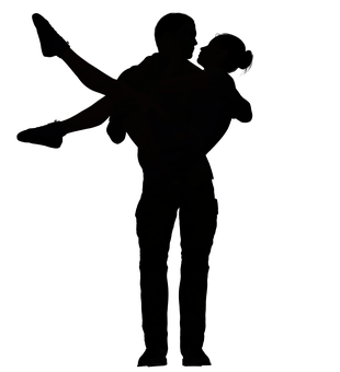 A Silhouette Of A Man Holding A Child