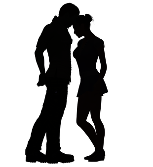 A Silhouette Of A Couple Kissing