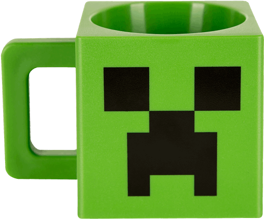 A Green Mug With A Face On It