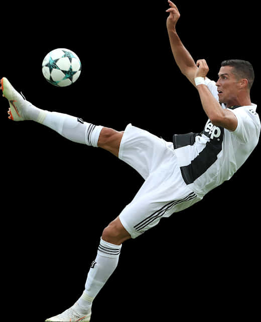A Man In A Football Uniform Kicking A Football Ball