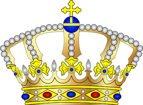 A Gold Crown With Blue And Red Gemstones