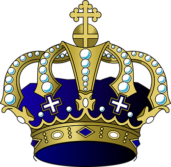 A Gold Crown With Diamonds And Crosses