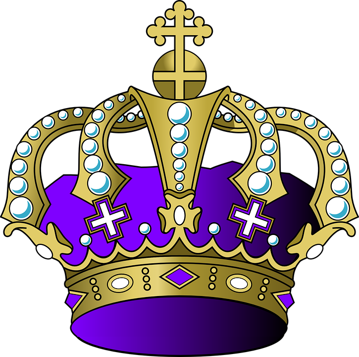 A Gold Crown With A Purple Crown And Cross