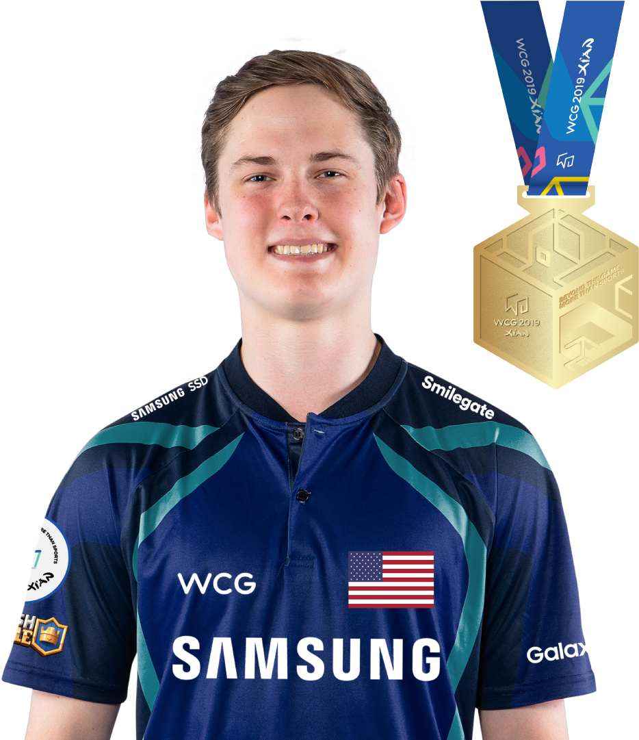 A Man Wearing A Blue Jersey With A Gold Medal