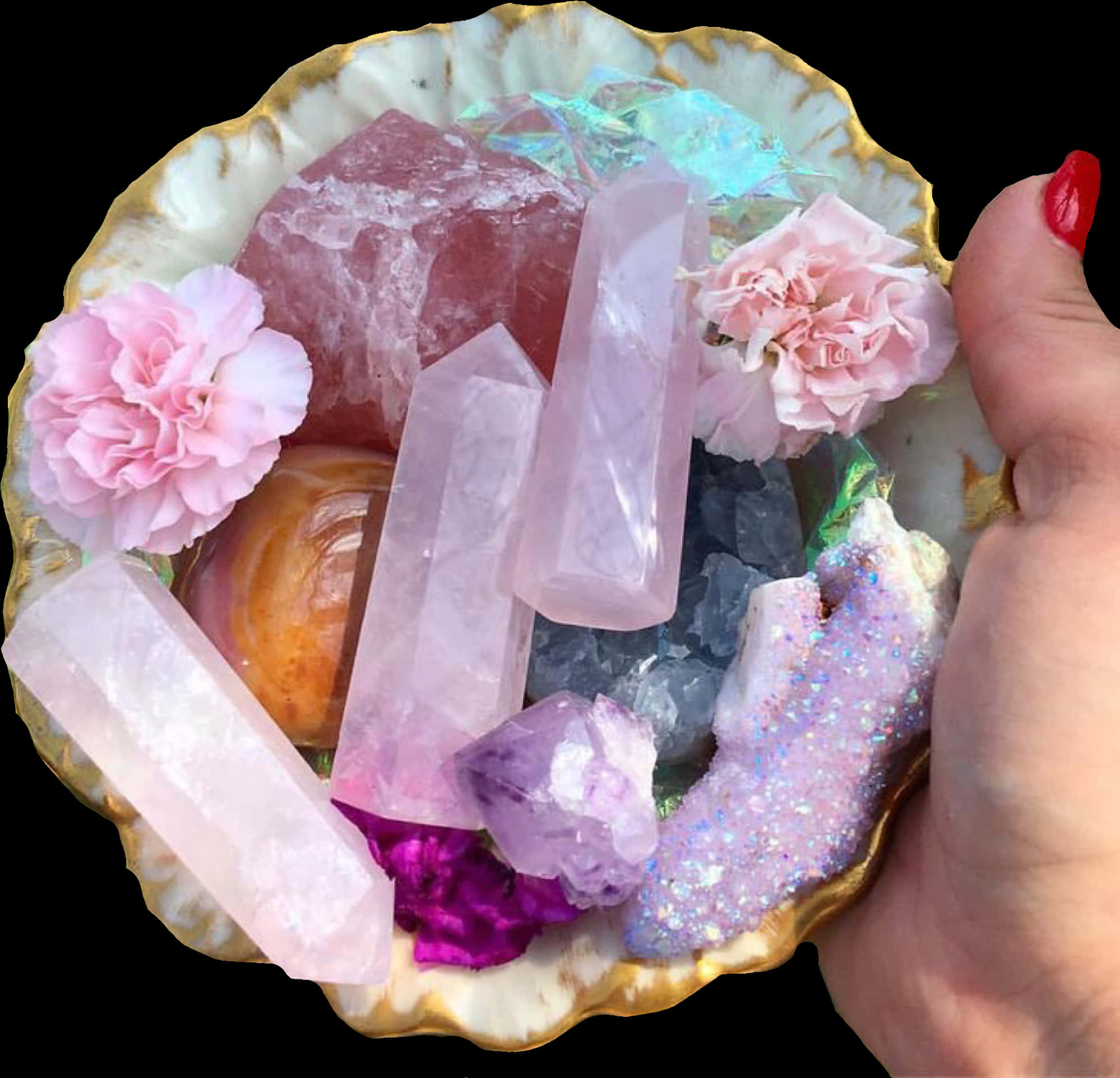 A Hand Holding A Bowl Of Crystals And Flowers