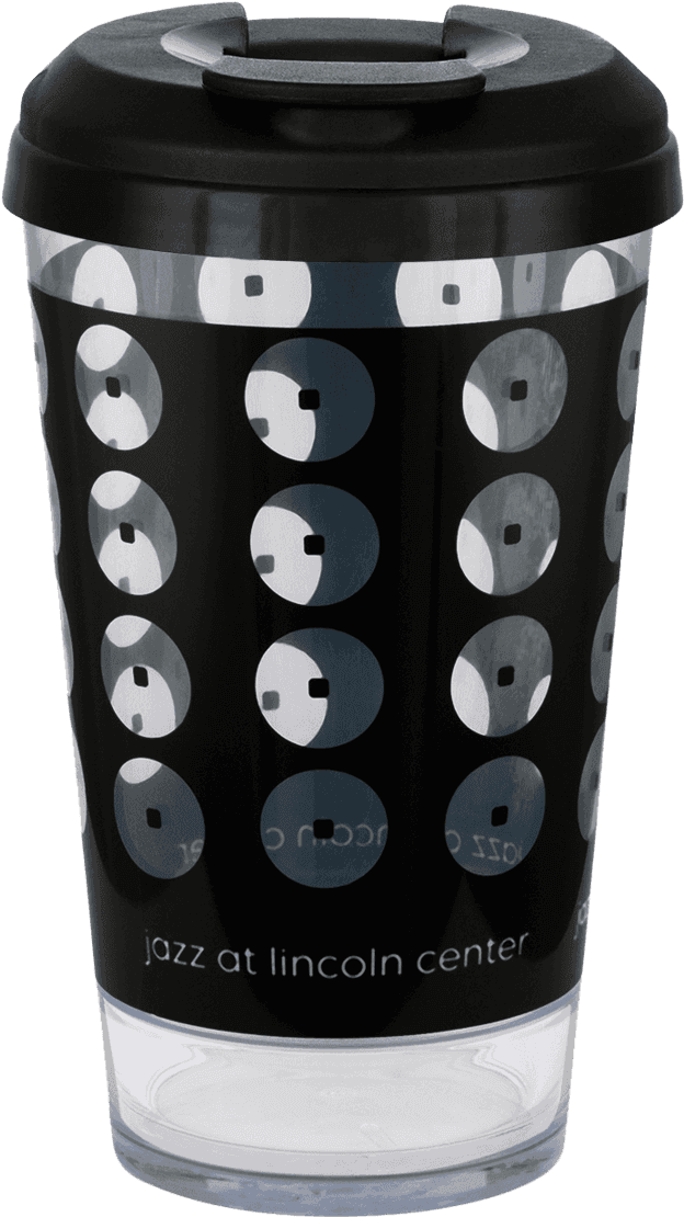 A Black And White Glass With Circles On It