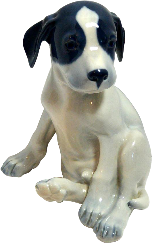 A White And Black Dog Statue