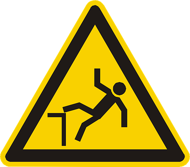 A Yellow Triangle Sign With A Person Falling On The Side