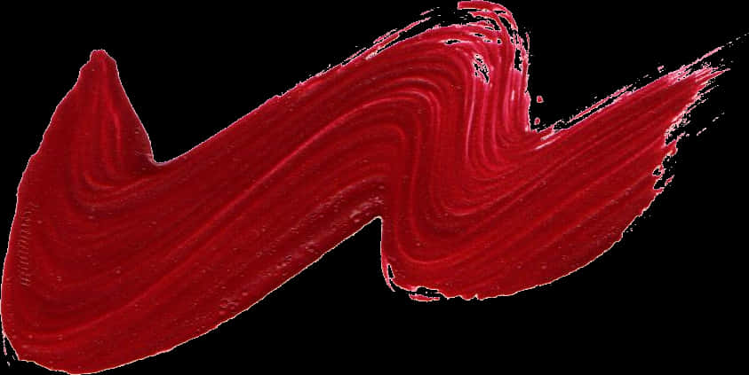 A Red Paint Smear On A Black Background