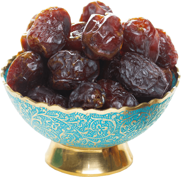 A Bowl Of Dates On A Black Background