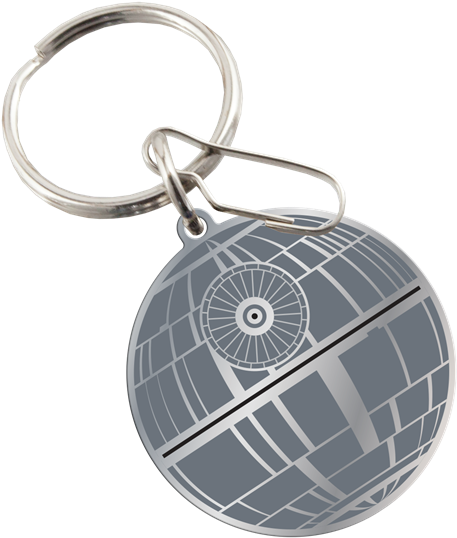 A Silver Key Chain With A Circular Design