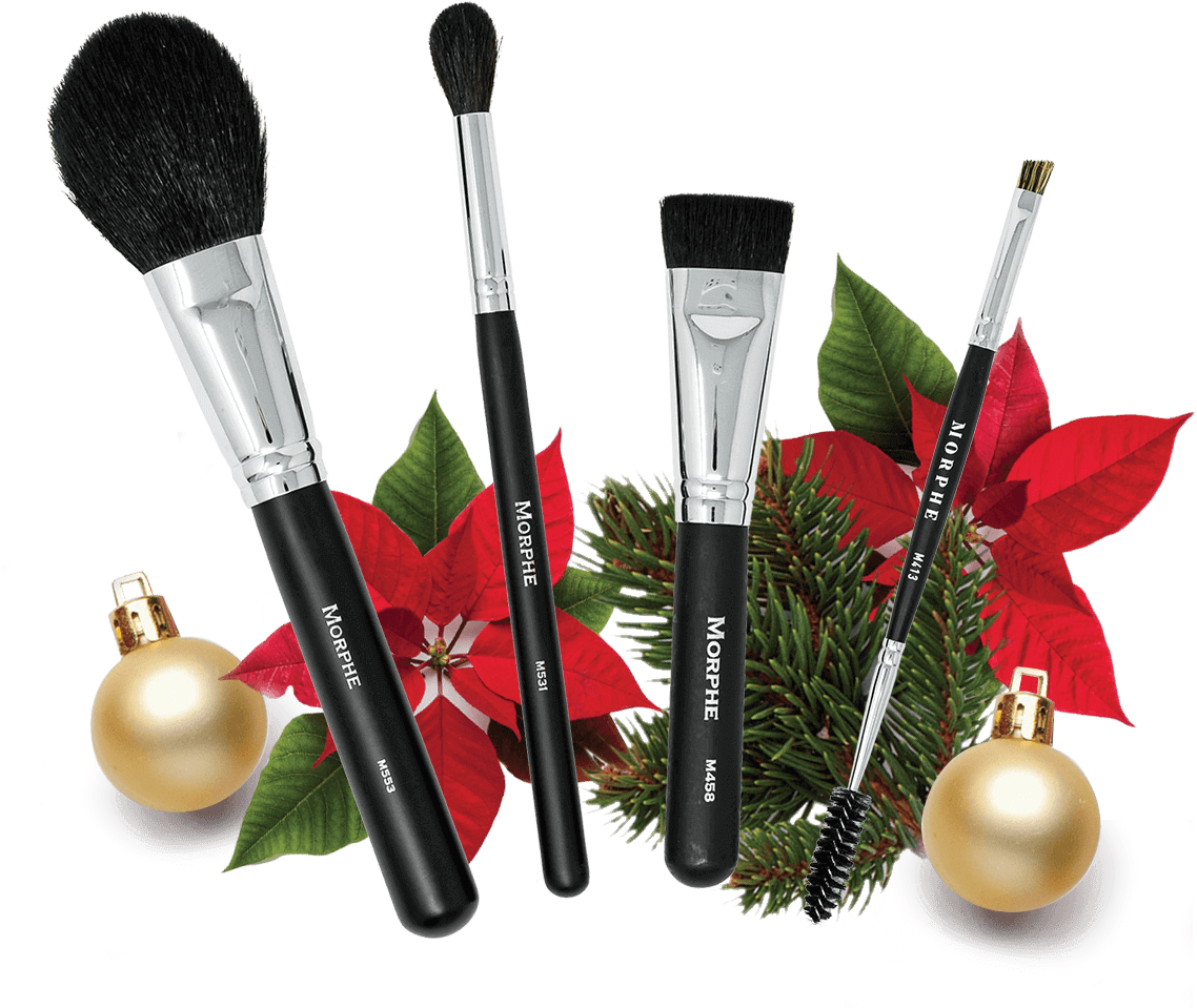 A Group Of Makeup Brushes And Ornaments