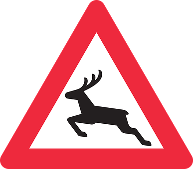 A Sign With A Deer In The Middle