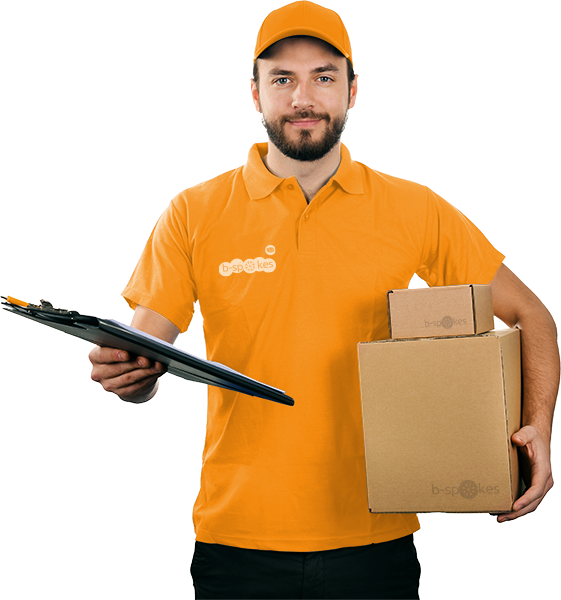 A Man In A Yellow Shirt Holding A Clipboard And A Box