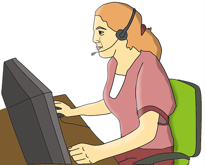 A Woman Wearing A Headset And Sitting At A Computer