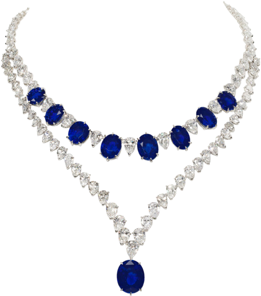 A Necklace With Blue Stones And Diamonds