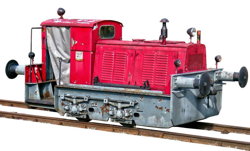 A Red And Grey Train On Tracks