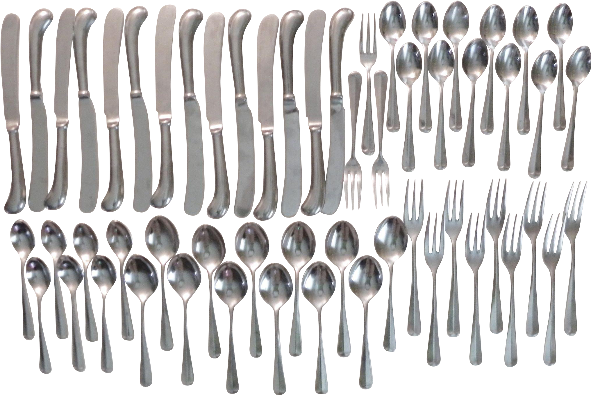 A Group Of Silverware On A Black Background
