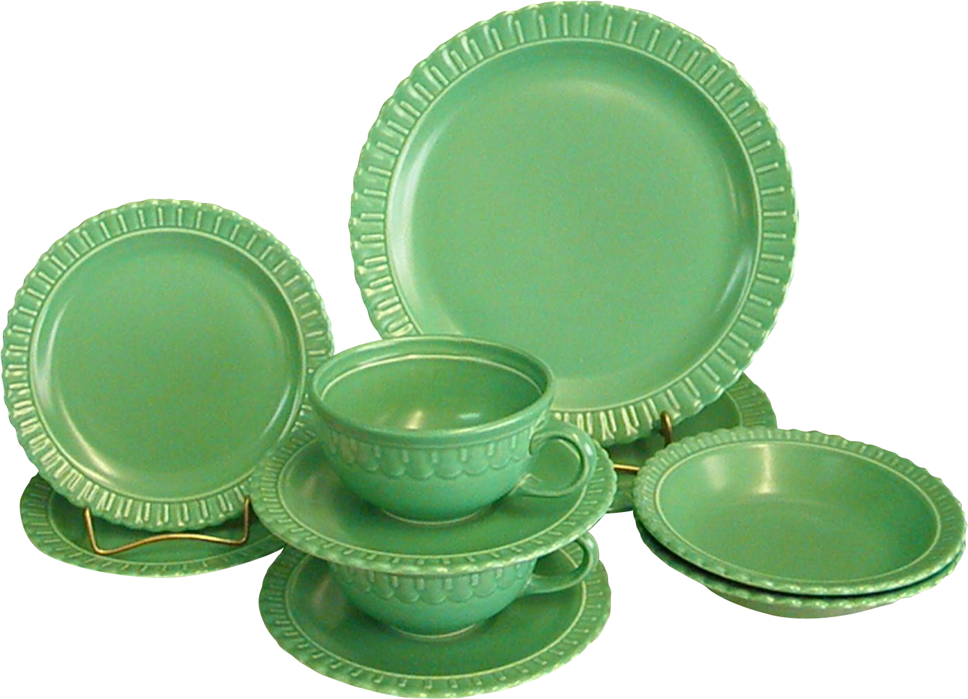 A Group Of Green Plates And Cups