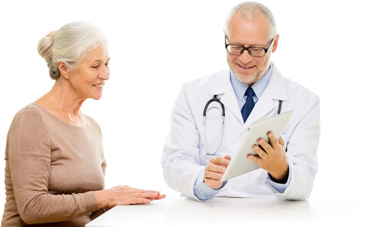 A Doctor Showing A Tablet To A Woman