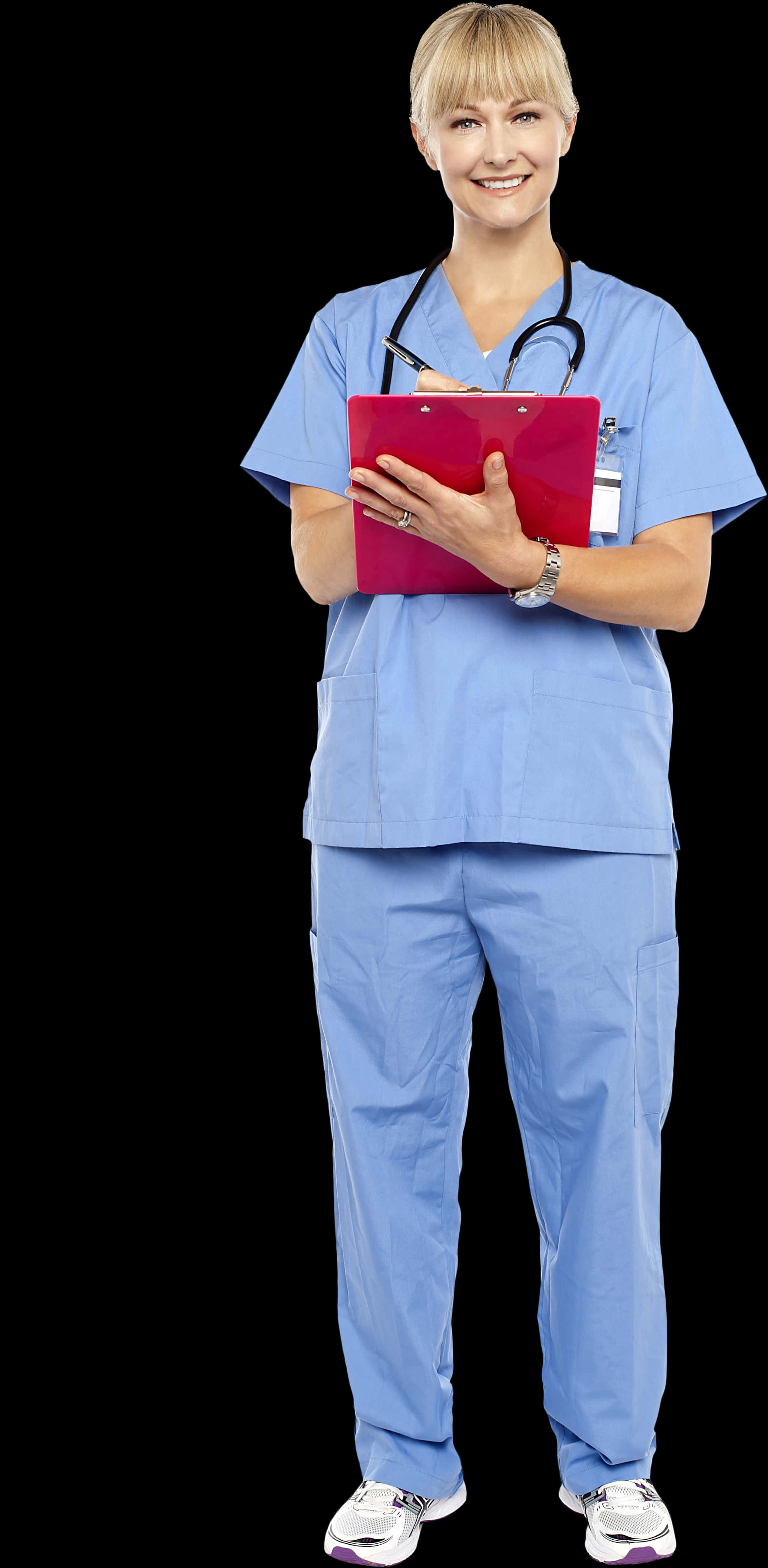 A Woman In Blue Scrubs Holding A Clipboard
