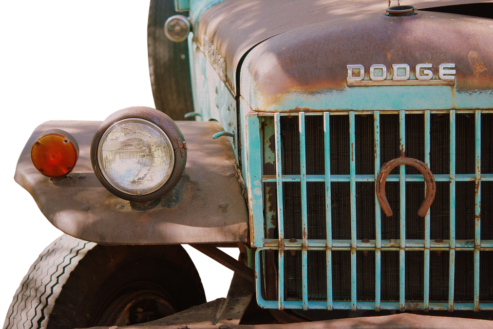 A Close Up Of A Rusty Car