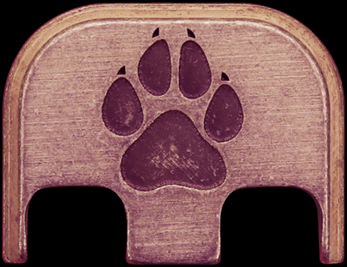 A Paw Print On A Piece Of Metal