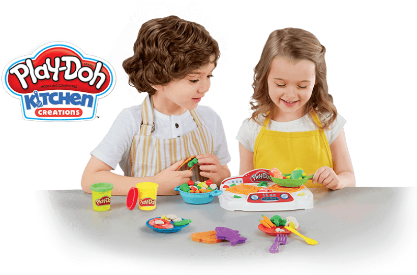 A Boy And Girl Playing With Play Dough