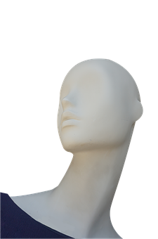 A White Mannequin Head With A Black Background