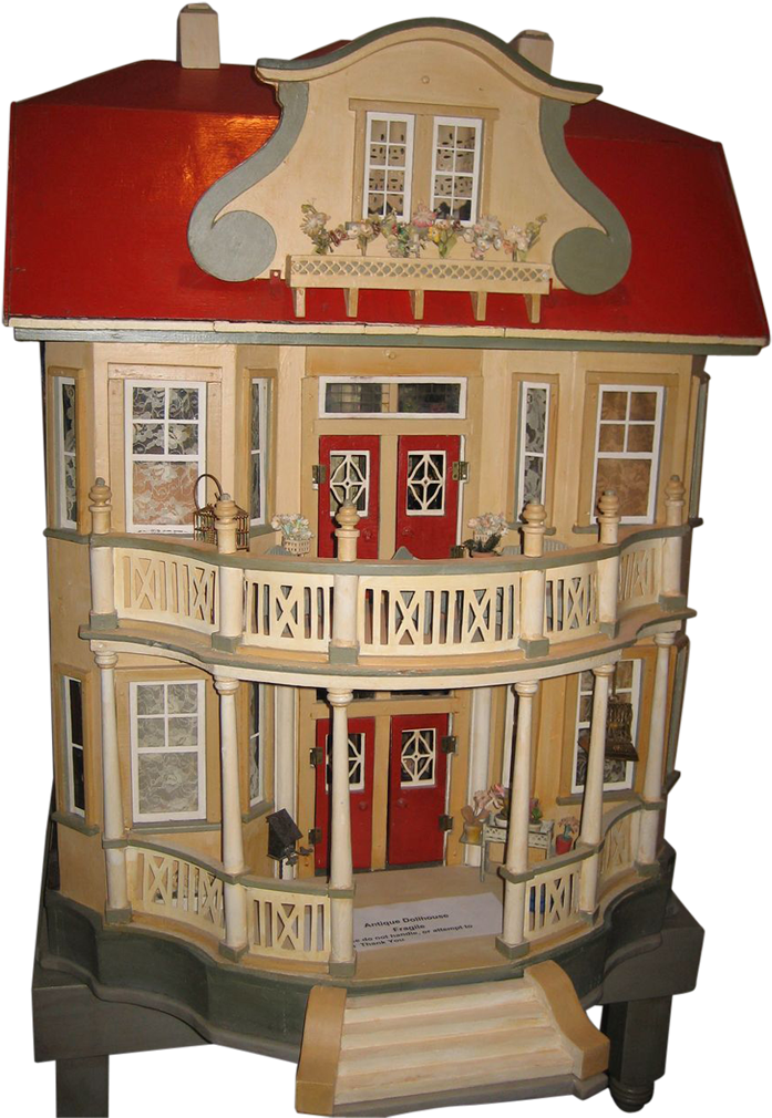 A Toy House With A Red Roof