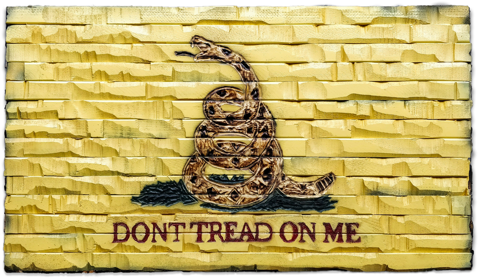 A Painted Snake On A Yellow Brick Wall