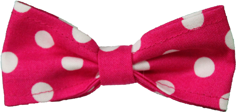 A Pink Bow Tie With White Dots