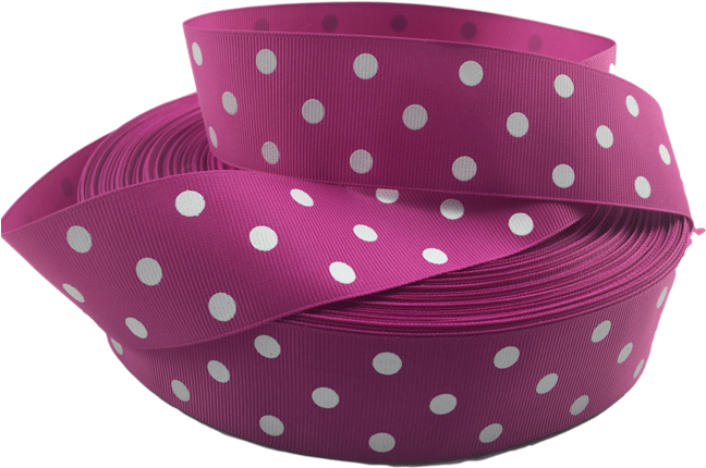 A Roll Of Pink Ribbon With White Polka Dots