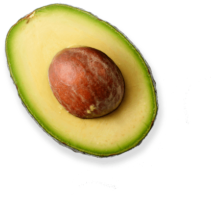 A Half Of An Avocado With A Seed Inside