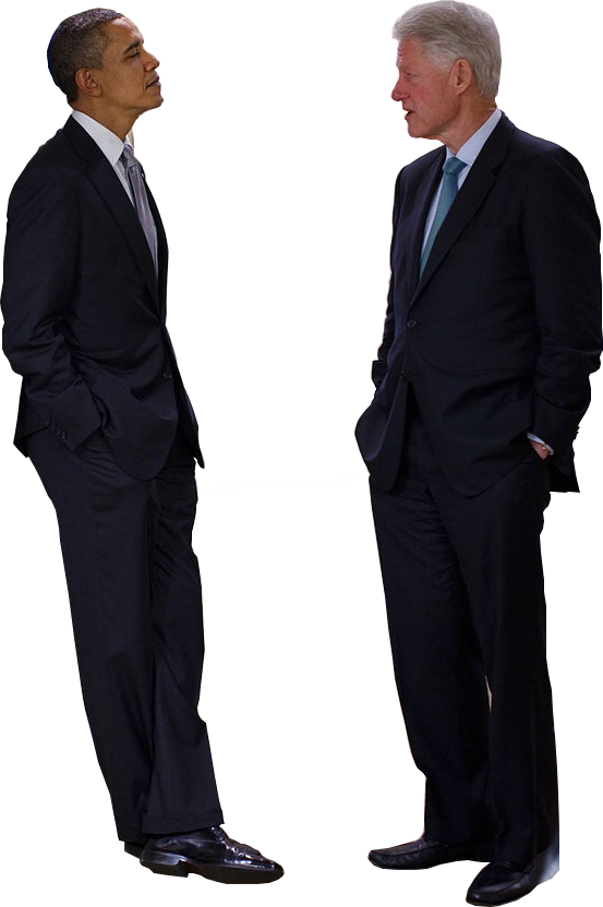 Two Men In Suits Standing And Posing For The Camera