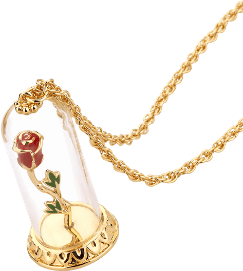 A Gold Necklace With A Rose In A Glass Flask