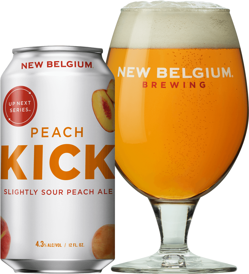 A Can Of Peach Beer Next To A Glass Of Beer